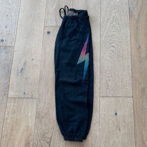XS Black Aviator Nation Joggers with Multicolor Lightning Bolt.